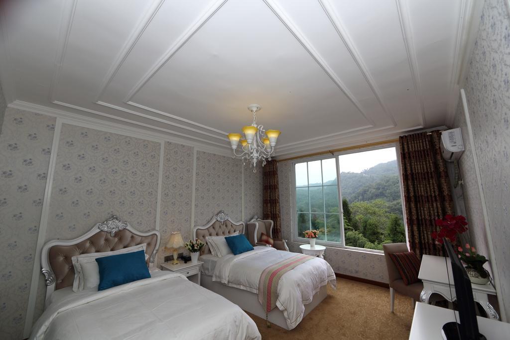 Panshan Tingquan Tuwo Holiday Resort Leshan Room photo